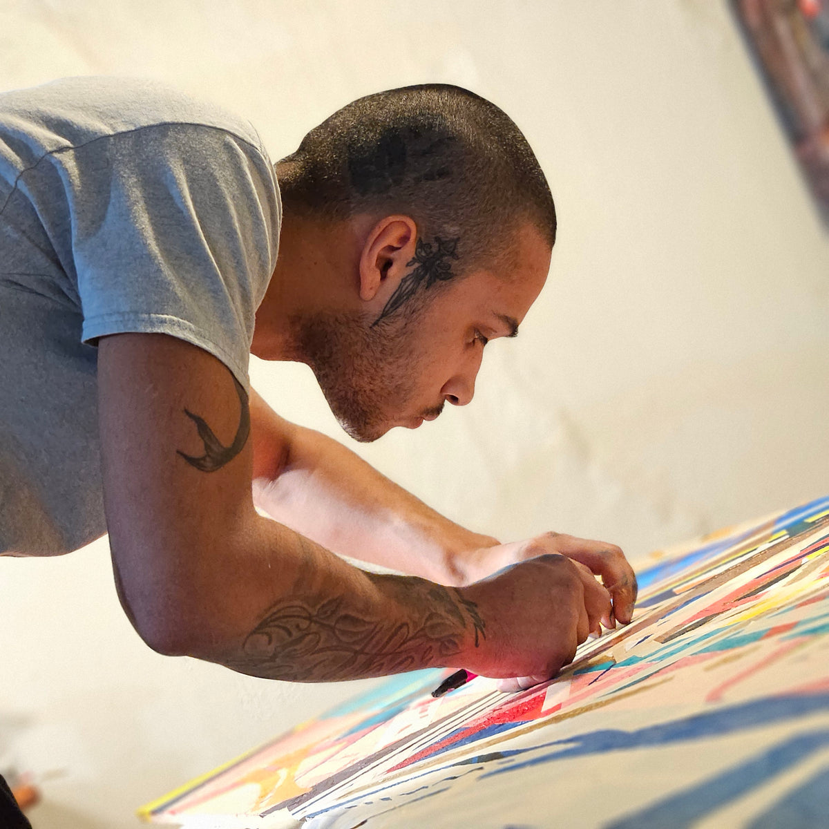 John Safana working on an artwork